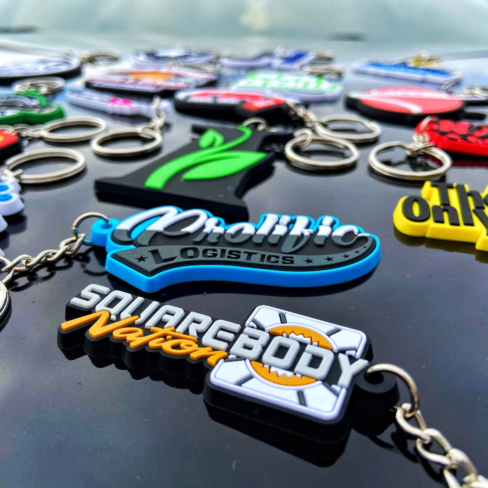 custom keychains upclose showing business logos.
