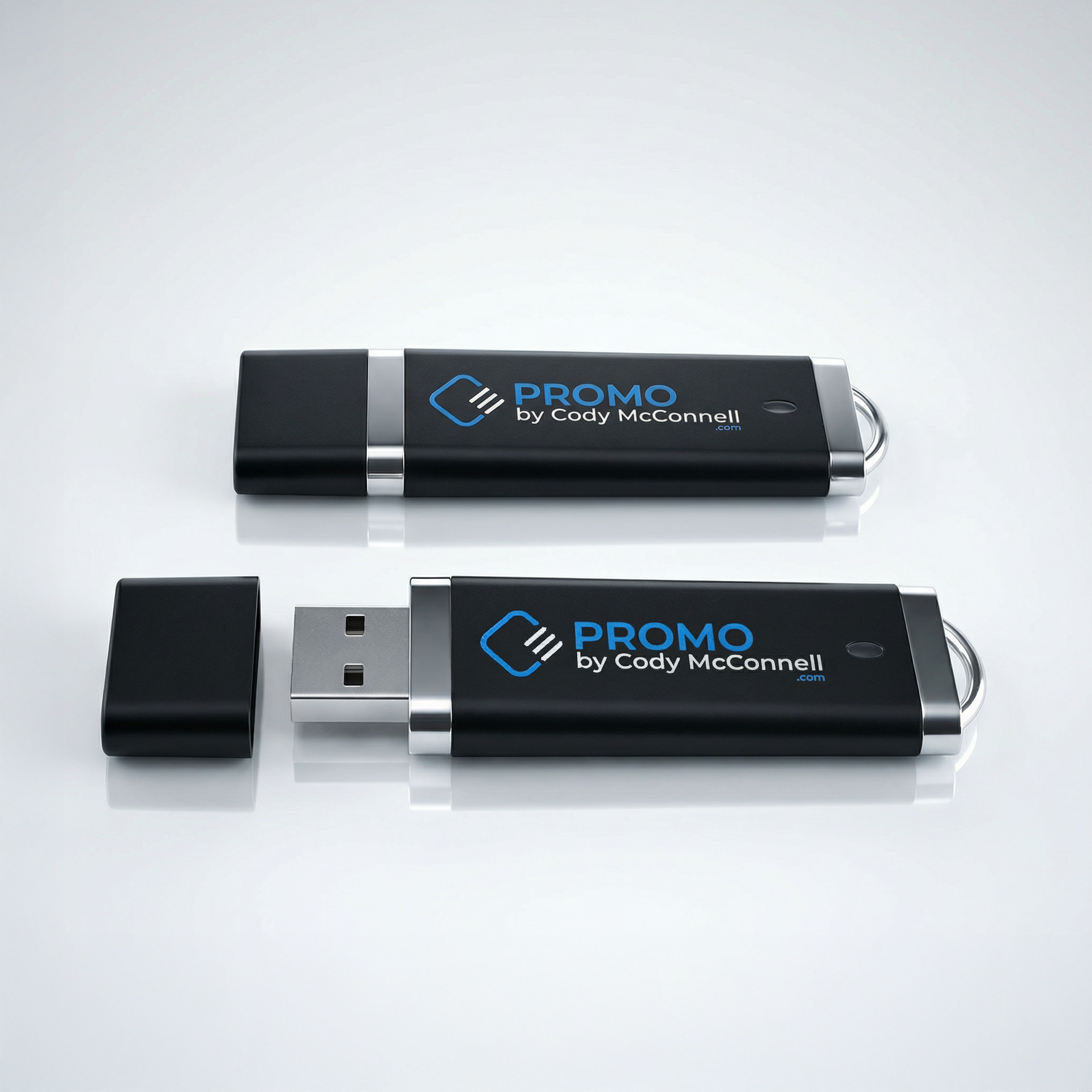 Two USB drives with 'Promo by Cody McConnell' branding on a light gray background