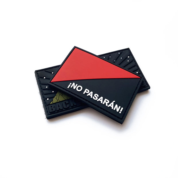 Two custom PVC Velcro patches with a raised 3D logo design, featuring a mountain and starry sky motif, embossed text, and durable rubber material.