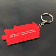 back of a custom keychain showing text added
